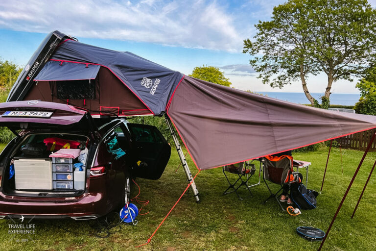 Camping mit Dachzelt: iKamper Dachzelt mit Sonnensegel auf Opel Insignia Camping mit Dachzelt: iKamper Dachzelt mit Sonnensegel auf Opel Insignia